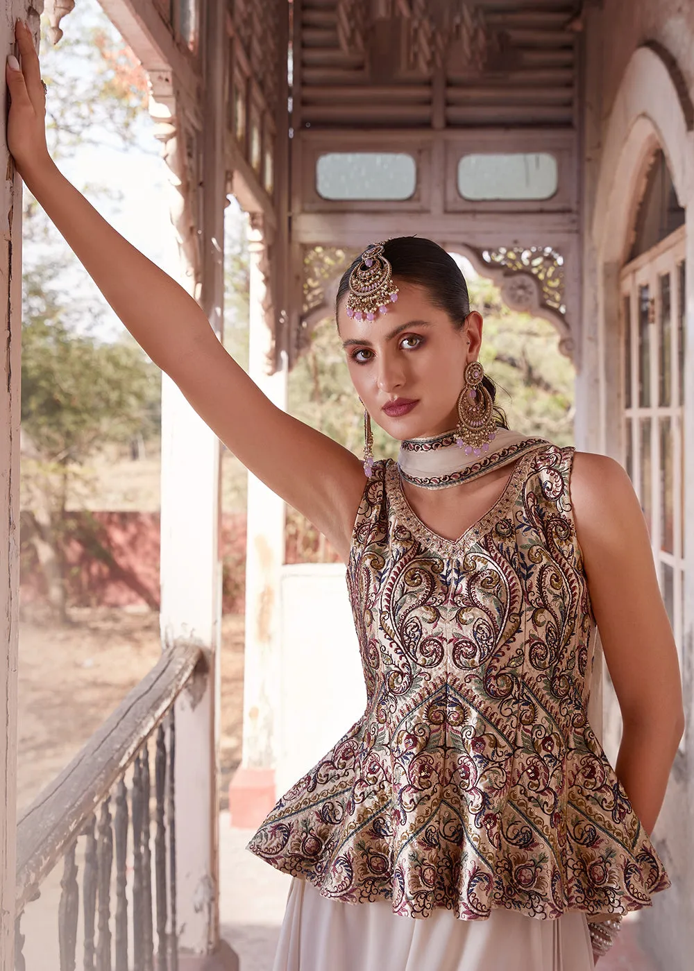 Austonishing Off White Georgette Peplum Style Sharara Suit