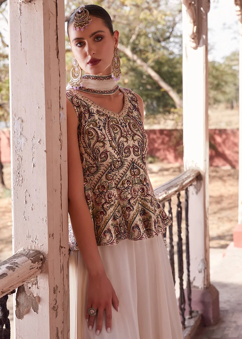 Austonishing Off White Georgette Peplum Style Sharara Suit
