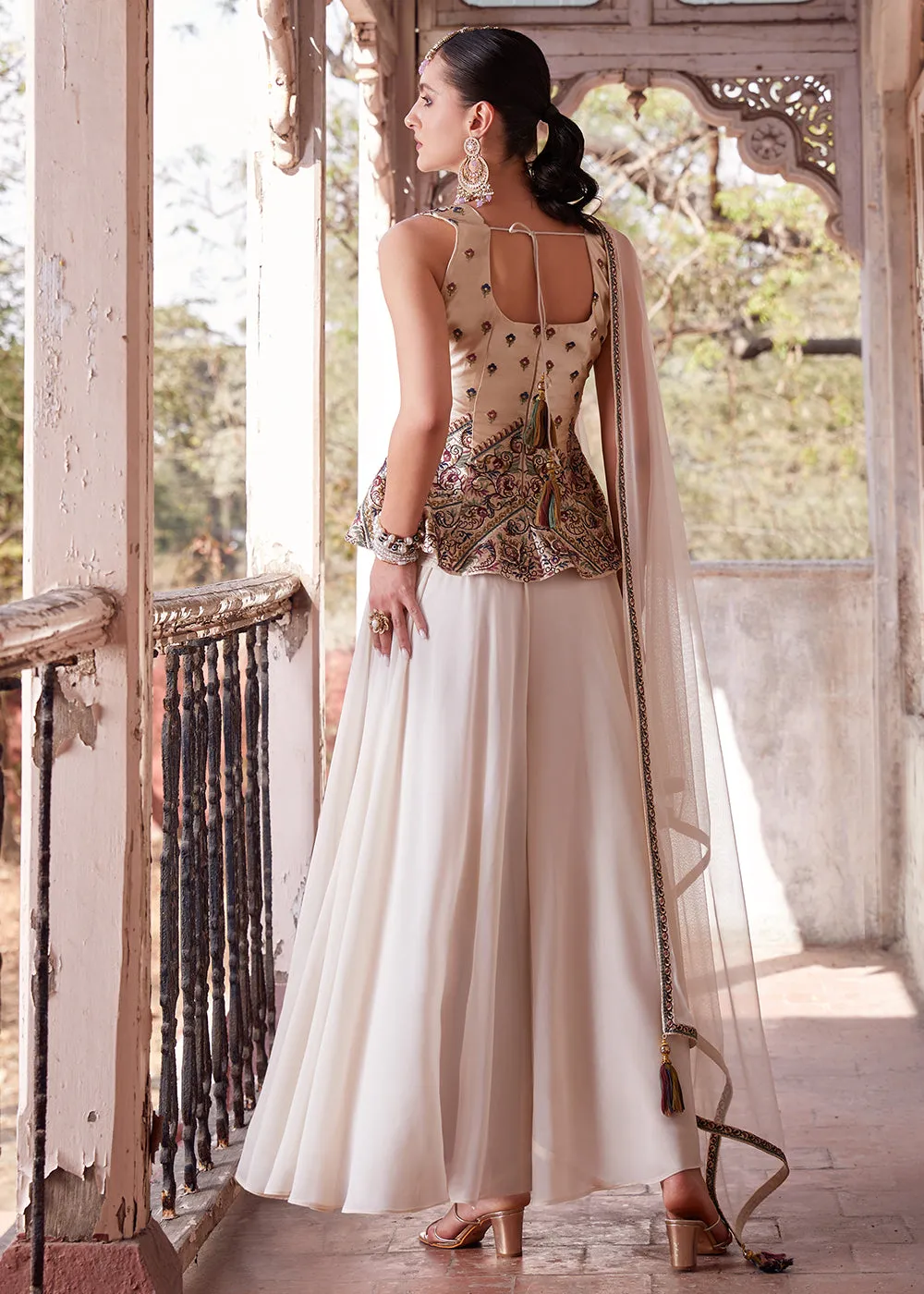 Austonishing Off White Georgette Peplum Style Sharara Suit